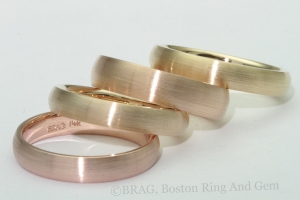 A rainbow of 14k and 18k Yellow and Rose Men's Wedding Rings