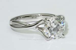 platinum engagement ring diamond solitaire unique twist