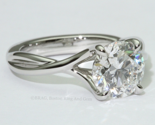 platinum engagement ring diamond solitaire unique twist