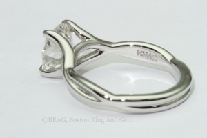 platinum engagement ring diamond solitaire unique twist