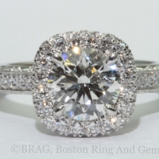 Vintage antique cushion platinum diamond halo engagement ring