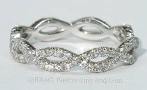 Baguette diamonds set in rose gold channel eternity wedding ring