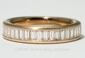 Baguette diamonds set in rose gold channel eternity wedding ring