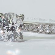 Platinum and diamond Cathedral tapered solitaire with Mill grain edge