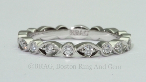 Round and marquise alternating Platinum and diamond eternity wedding ring