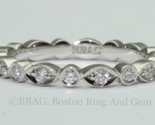 Round and marquise alternating Platinum and diamond eternity wedding ring