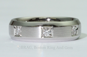 Platinum and diamond inset bevel edge men's wedding ring