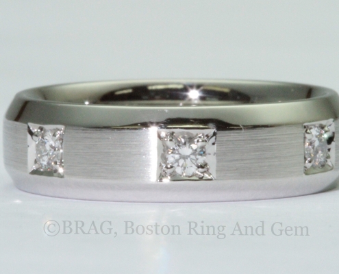 Platinum and diamond inset bevel edge men's wedding ring