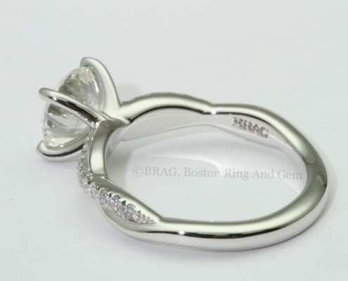 platinum engagement ring diamond solitaire unique twist