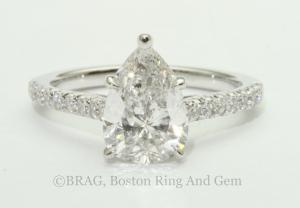 Pear shaped diamond solitaire engagement ring