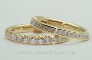 A pair of 18k yellow gold and diamond eternity wedding rings