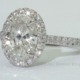 Oval brilliant cut diamond set in a fishtail set Oval halo on a cathedral band