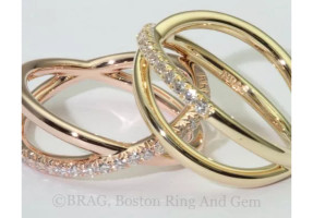 18k yellow and rose gold with French cut set diamonds crisscross ring