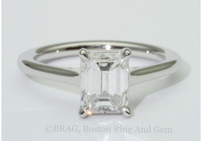 Emerald cut diamond set in platinum cathedral Solitaire Engagement Ring