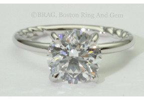 Platinum diamond solitaire with rope liner detail