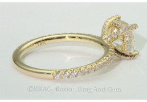 18k yellow gold and diamond solitaire with diamond set prongs, basket and band