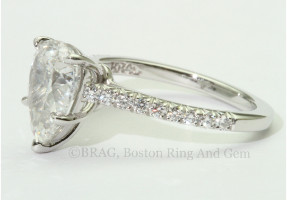 Pear shaped diamond solitaire engagement ring