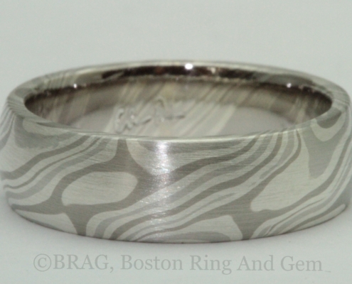 Chris Ploof Designs, Men’s 6 mm wide Mokume gane ring in the Ash pattern. Platinum, 14k palladium, white gold and silver