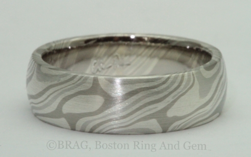 Chris Ploof Designs, Men’s 6 mm wide Mokume gane ring in the Ash pattern. Platinum, 14k palladium, white gold and silver