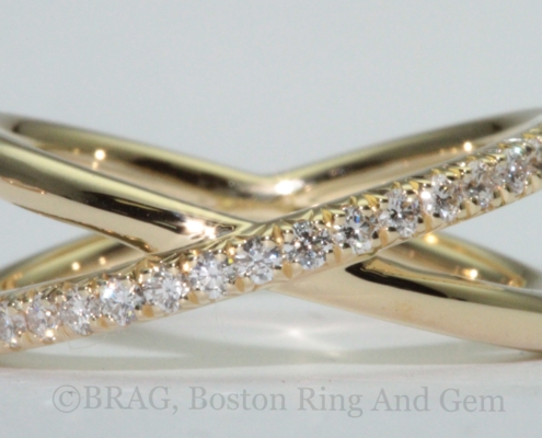 18k yellow gold with French cut set diamonds crisscross ring