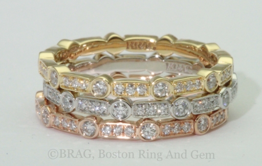 Art deco inspired stackable bands. Round diamonds set in alternating round bezel and rectangle bead set.