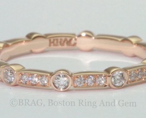 18k rose gold art deco wedding ring. Diamonds set in alternating round bezel and rectangle bead set.