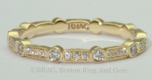 18k Yellow gold Art deco wedding ring. Diamonds set in alternating round bezel and rectangle bead set.