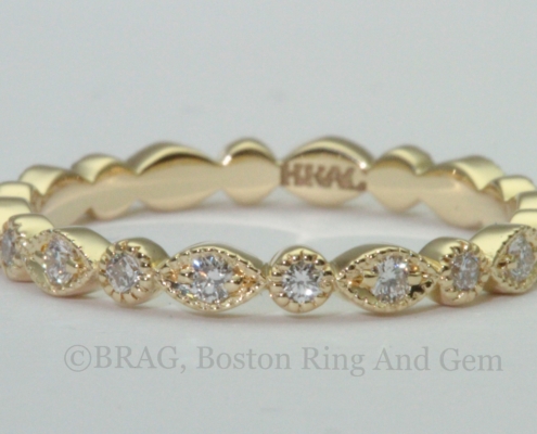 18k yellow gold marquise and round shaped eternity wedding band with mill grain edge