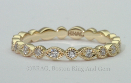 18k yellow gold marquise and round shaped eternity wedding band with mill grain edge