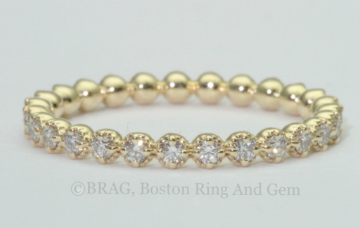 18k yellow gold beaded bezel eternity wedding band
