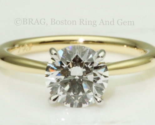2 tone platinum scroll basket on gold cathedral solitaire band