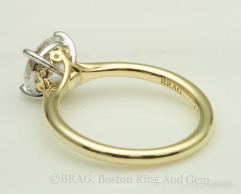 2 tone platinum scroll basket on gold cathedral solitaire band