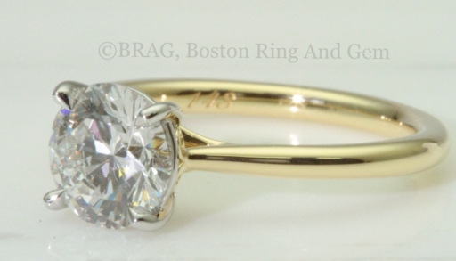 2 tone platinum scroll basket on gold cathedral solitaire band