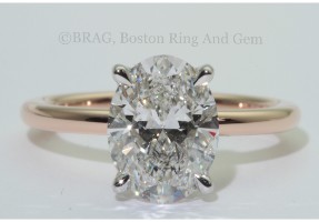 Oval two tone, platinum diamond basket rose gold