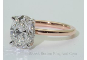 Oval two tone, platinum diamond basket rose gold