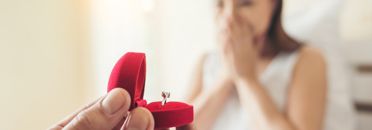 Young Man Bringing Ring Box For His Girlfriend At His Home