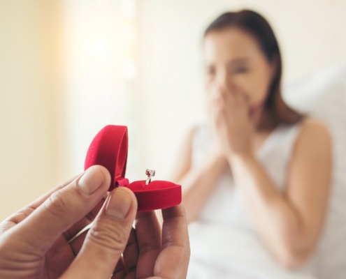 Young Man Bringing Ring Box For His Girlfriend At His Home